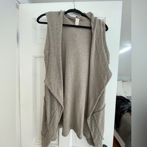 Hooded asymmetrical vest